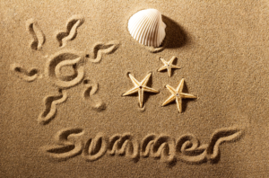 Summer written in sand
